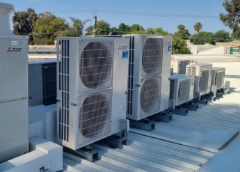 Commercial HVAC system installation in a large office building with multiple ductworks